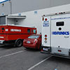 Two Brinks Armored Service vehicles