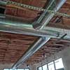 Spiral ductwork in interior of MOD Pizza
