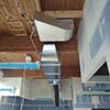 Auburn 7-11 exposed hardwood ceiling with ductwork